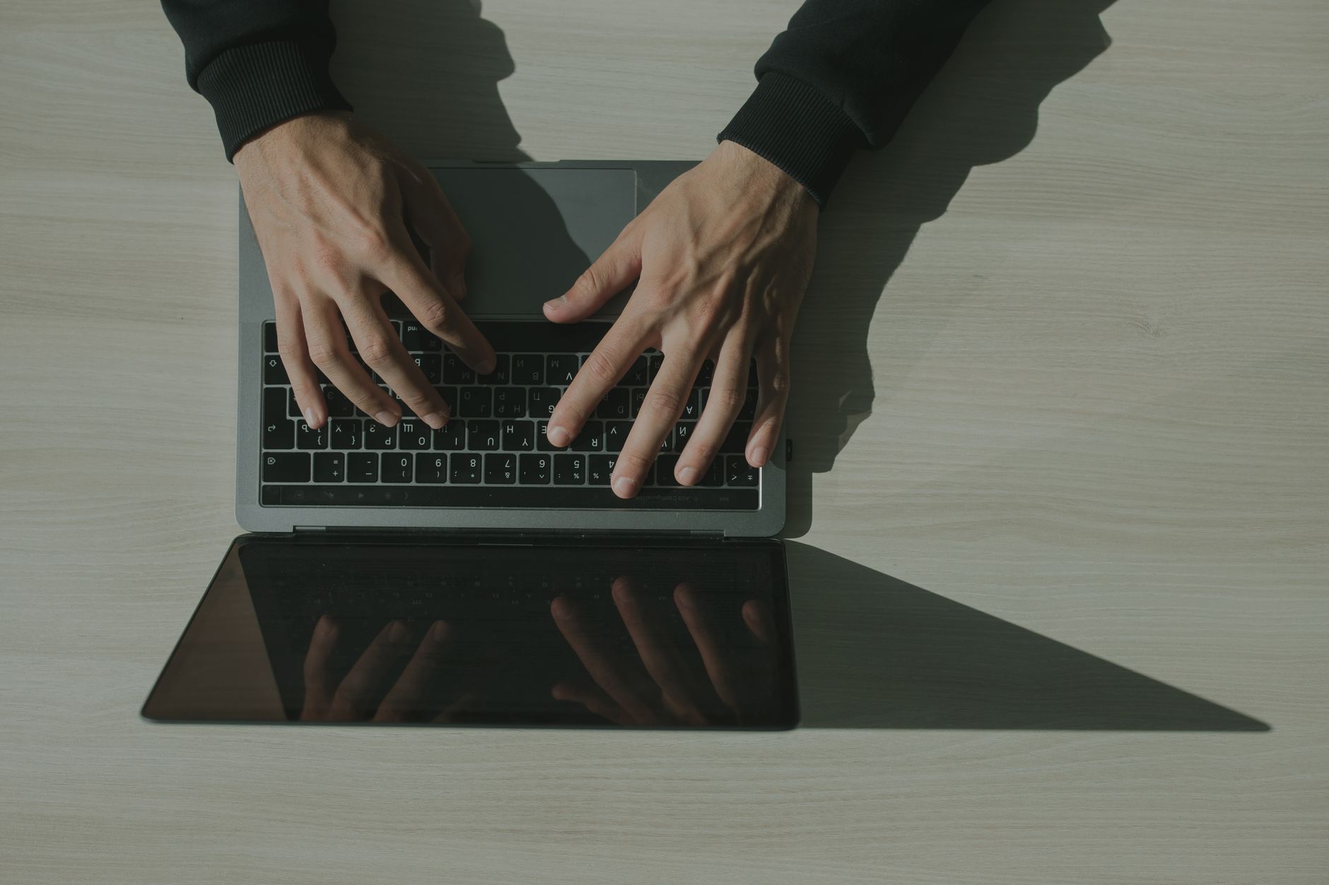 Person using best antivirus software UK 2026 on a laptop at home