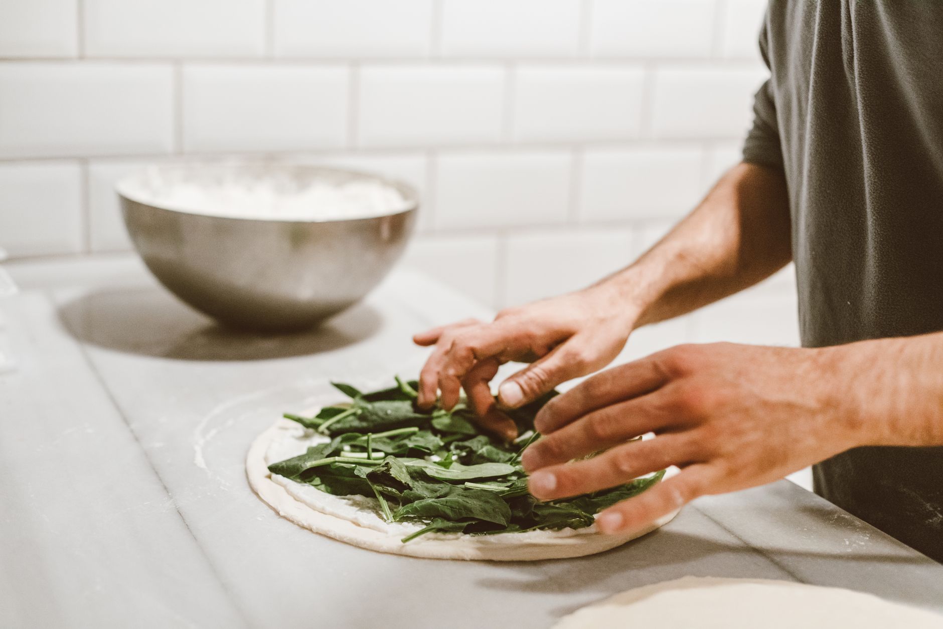 Home cook preparing fresh ingredients from a UK meal kit delivery service