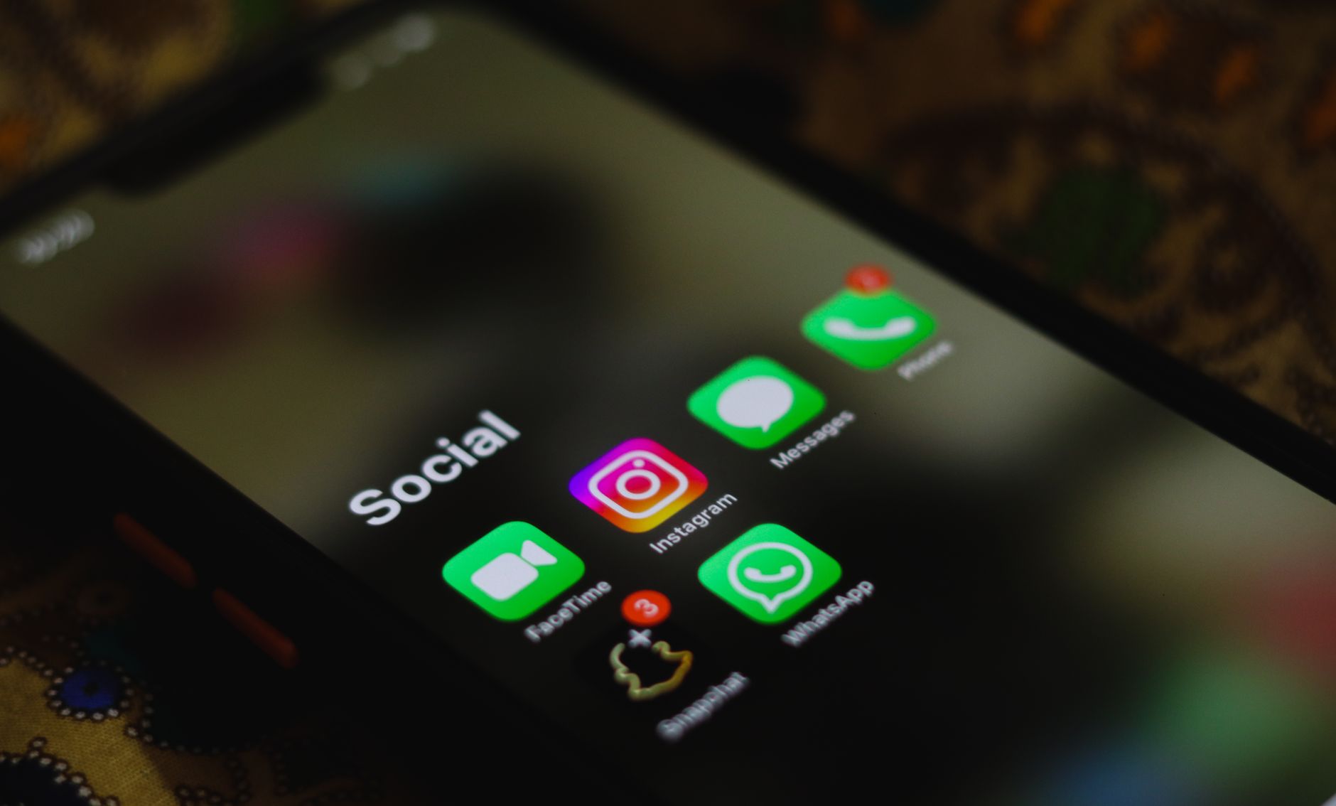 Smartphone displaying UK personal finance podcasts app with episode list visible
